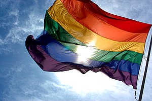 English: Rainbow flag flapping in the wind wit... English: Rainbow flag flapping in the wind wit...