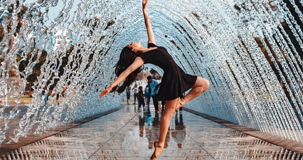 a woman striking a ballet pose