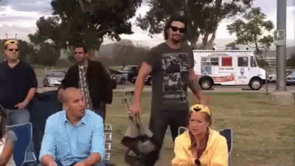 meme: handsome guy marches over with a folding chair, opens it with a firm hand motion, and sits down. caption: dis gon b gud
A woman in yellow gives him a curious look as he sits.