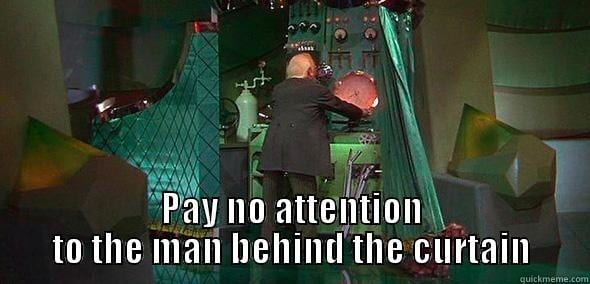 wizard of oz scene: pay no attention to the man behind the curtain