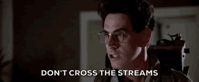 egon explains that crossing the streams is super bad. caption: "what non-overlapping magisteria actually means."